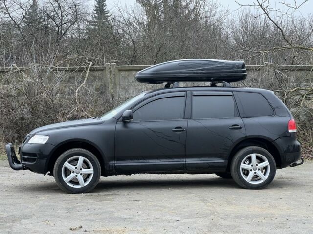 Чорний Фольксваген Туарег, об'ємом двигуна 3 л та пробігом 496 тис. км за 3999 $, фото 1 на Automoto.ua