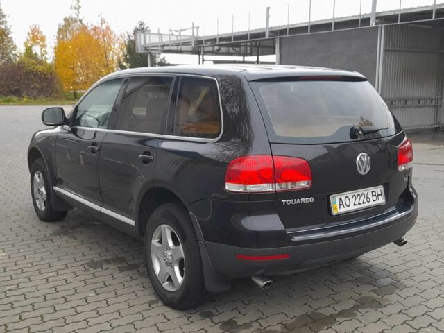Черный Фольксваген Туарег, объемом двигателя 2.5 л и пробегом 245 тыс. км за 8000 $, фото 1 на Automoto.ua
