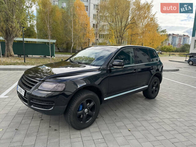 Черный Фольксваген Туарег, объемом двигателя 2.97 л и пробегом 325 тыс. км за 8850 $, фото 14 на Automoto.ua