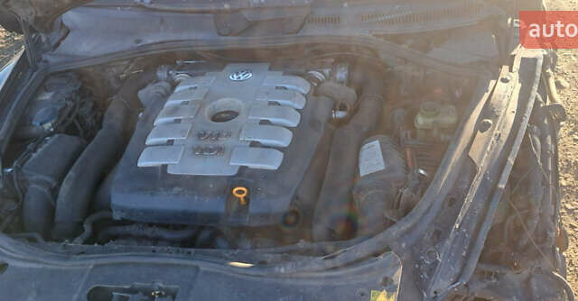 Черный Фольксваген Туарег, объемом двигателя 4.92 л и пробегом 210 тыс. км за 2999 $, фото 2 на Automoto.ua