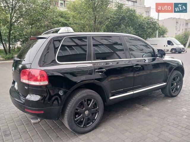 Черный Фольксваген Туарег, объемом двигателя 3.2 л и пробегом 280 тыс. км за 7700 $, фото 4 на Automoto.ua