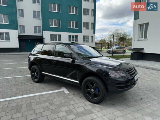 Черный Фольксваген Туарег, объемом двигателя 2.97 л и пробегом 325 тыс. км за 8850 $, фото 11 на Automoto.ua