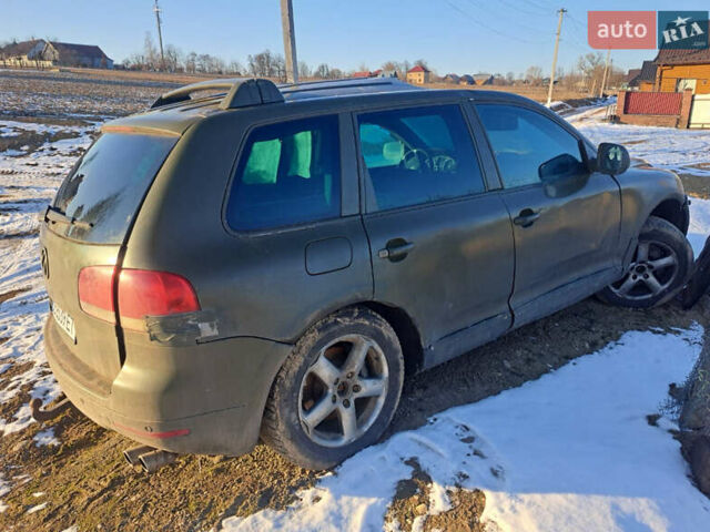 Черный Фольксваген Туарег, объемом двигателя 4.92 л и пробегом 210 тыс. км за 2999 $, фото 1 на Automoto.ua