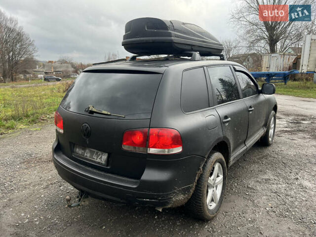 Чорний Фольксваген Туарег, об'ємом двигуна 3 л та пробігом 496 тис. км за 4200 $, фото 4 на Automoto.ua