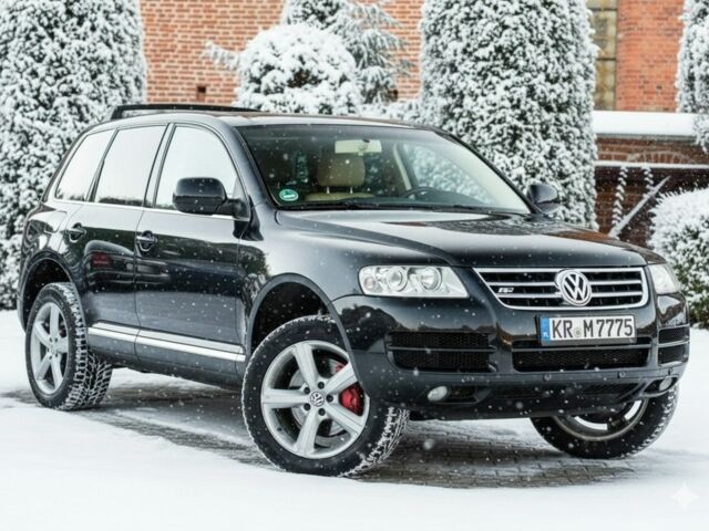 Черный Фольксваген Туарег, объемом двигателя 3 л и пробегом 266 тыс. км за 4350 $, фото 3 на Automoto.ua