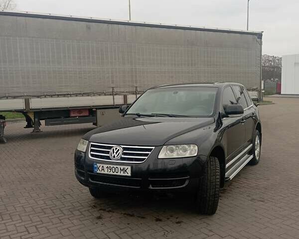 Черный Фольксваген Туарег, объемом двигателя 4.17 л и пробегом 316 тыс. км за 7500 $, фото 1 на Automoto.ua