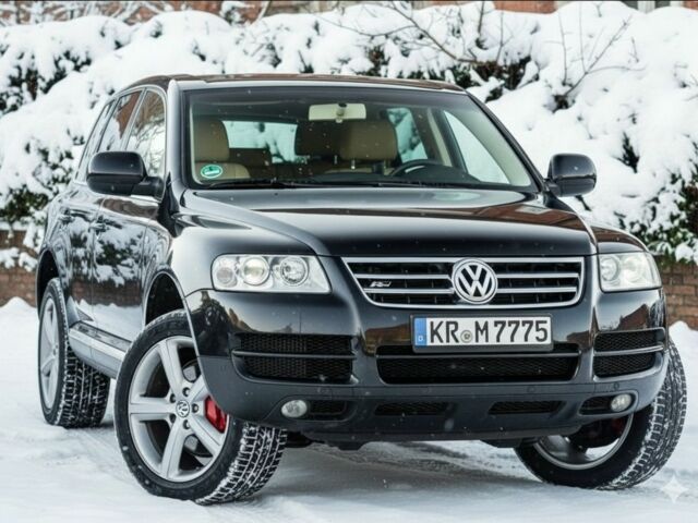 Черный Фольксваген Туарег, объемом двигателя 3 л и пробегом 266 тыс. км за 4350 $, фото 1 на Automoto.ua