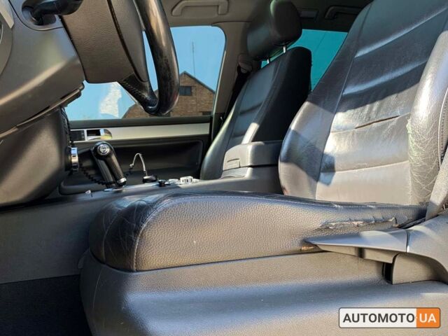 Черный Фольксваген Туарег, объемом двигателя 3 л и пробегом 268 тыс. км за 9999 $, фото 9 на Automoto.ua