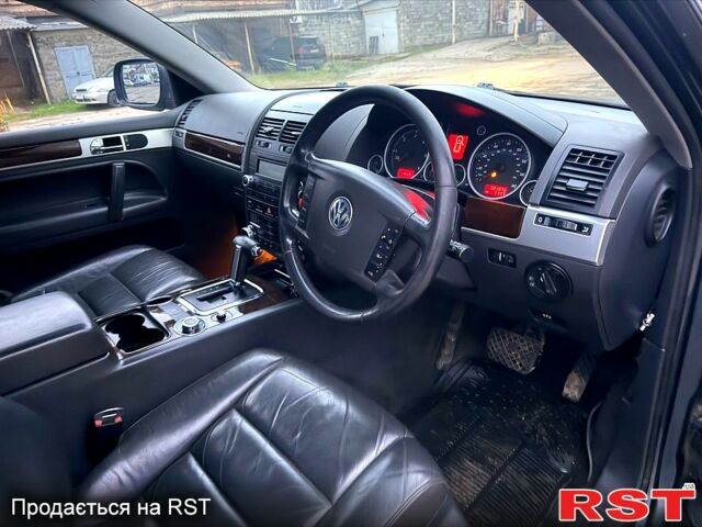 Чорний Фольксваген Туарег, об'ємом двигуна 3 л та пробігом 277 тис. км за 4300 $, фото 6 на Automoto.ua