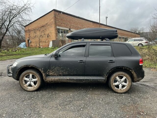 Черный Фольксваген Туарег, объемом двигателя 3 л и пробегом 496 тыс. км за 4250 $, фото 2 на Automoto.ua