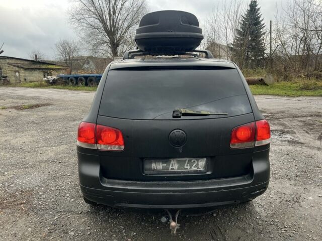 Черный Фольксваген Туарег, объемом двигателя 3 л и пробегом 496 тыс. км за 4250 $, фото 4 на Automoto.ua