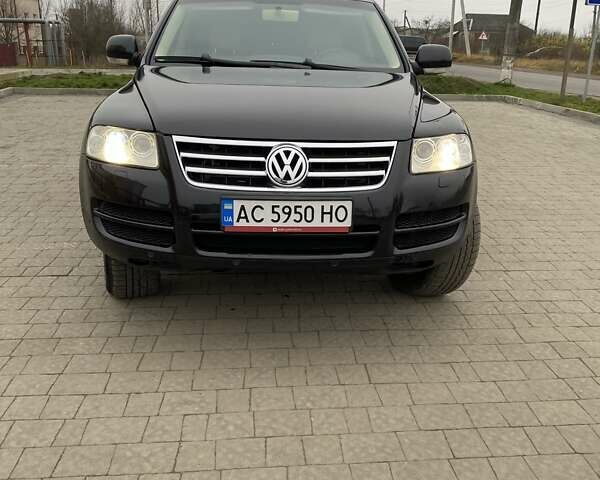 Черный Фольксваген Туарег, объемом двигателя 2.97 л и пробегом 390 тыс. км за 8700 $, фото 9 на Automoto.ua