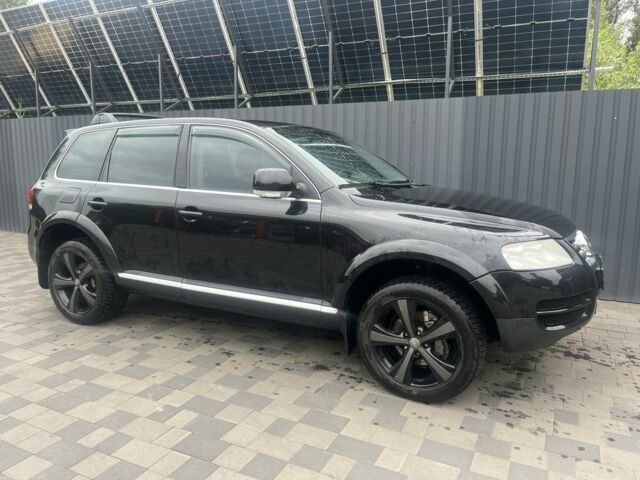 Черный Фольксваген Туарег, объемом двигателя 4.2 л и пробегом 250 тыс. км за 9999 $, фото 4 на Automoto.ua