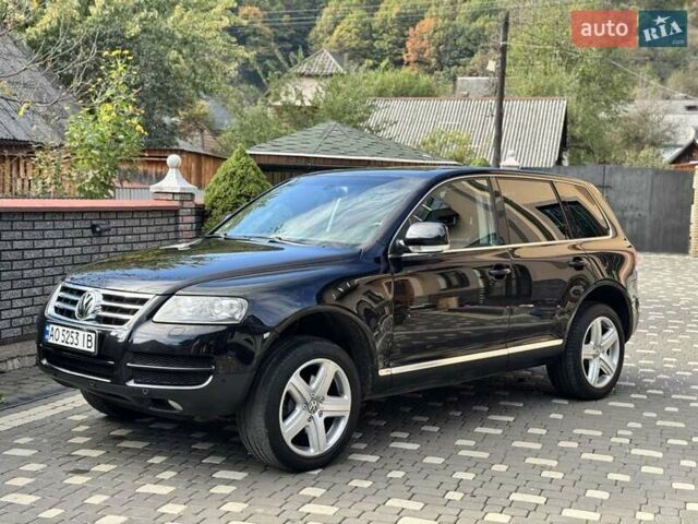 Черный Фольксваген Туарег, объемом двигателя 3 л и пробегом 187 тыс. км за 12000 $, фото 1 на Automoto.ua