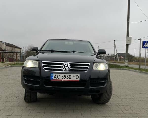 Черный Фольксваген Туарег, объемом двигателя 2.97 л и пробегом 390 тыс. км за 8700 $, фото 2 на Automoto.ua