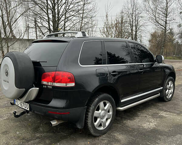 Черный Фольксваген Туарег, объемом двигателя 3 л и пробегом 325 тыс. км за 5900 $, фото 5 на Automoto.ua