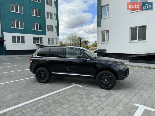 Черный Фольксваген Туарег, объемом двигателя 2.97 л и пробегом 325 тыс. км за 8850 $, фото 3 на Automoto.ua