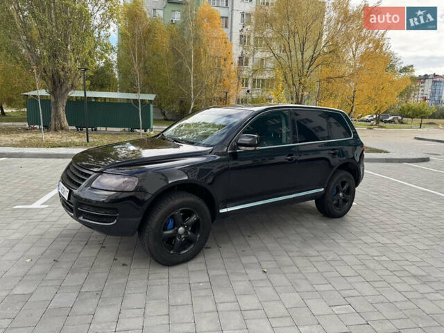 Черный Фольксваген Туарег, объемом двигателя 2.97 л и пробегом 325 тыс. км за 8850 $, фото 13 на Automoto.ua