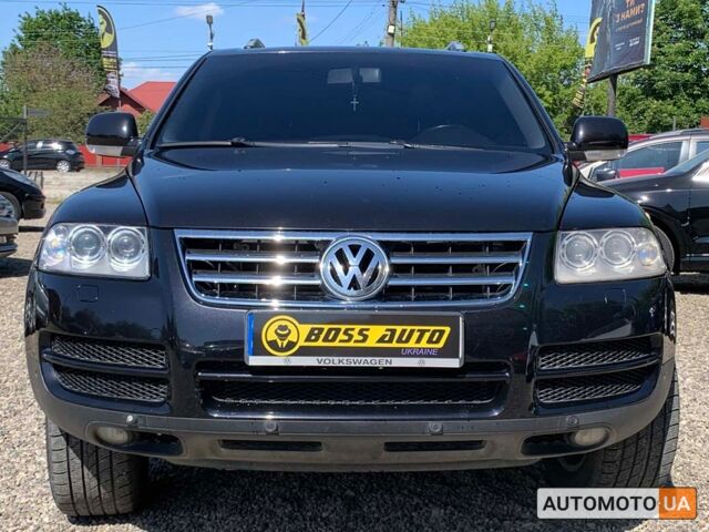 Черный Фольксваген Туарег, объемом двигателя 3 л и пробегом 268 тыс. км за 9999 $, фото 1 на Automoto.ua