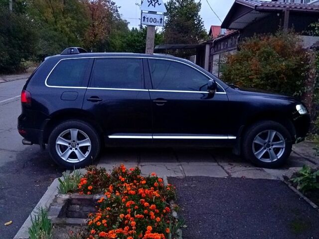 Черный Фольксваген Туарег, объемом двигателя 2.5 л и пробегом 351 тыс. км за 7500 $, фото 5 на Automoto.ua