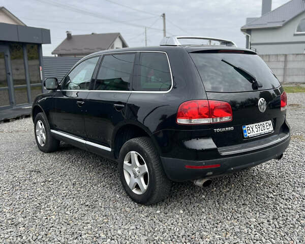 Чорний Фольксваген Туарег, об'ємом двигуна 2.46 л та пробігом 190 тис. км за 8800 $, фото 5 на Automoto.ua