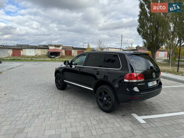 Черный Фольксваген Туарег, объемом двигателя 2.97 л и пробегом 325 тыс. км за 8850 $, фото 10 на Automoto.ua