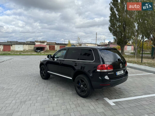 Черный Фольксваген Туарег, объемом двигателя 2.97 л и пробегом 325 тыс. км за 8850 $, фото 5 на Automoto.ua
