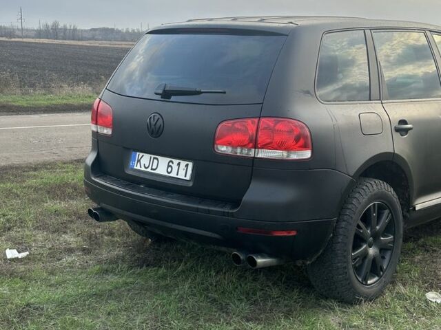 Чорний Фольксваген Туарег, об'ємом двигуна 3 л та пробігом 326 тис. км за 4800 $, фото 3 на Automoto.ua