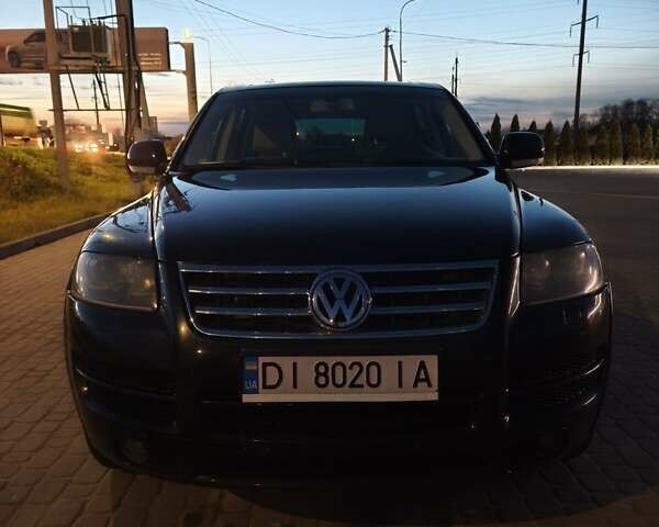 Чорний Фольксваген Туарег, об'ємом двигуна 3 л та пробігом 311 тис. км за 8600 $, фото 2 на Automoto.ua