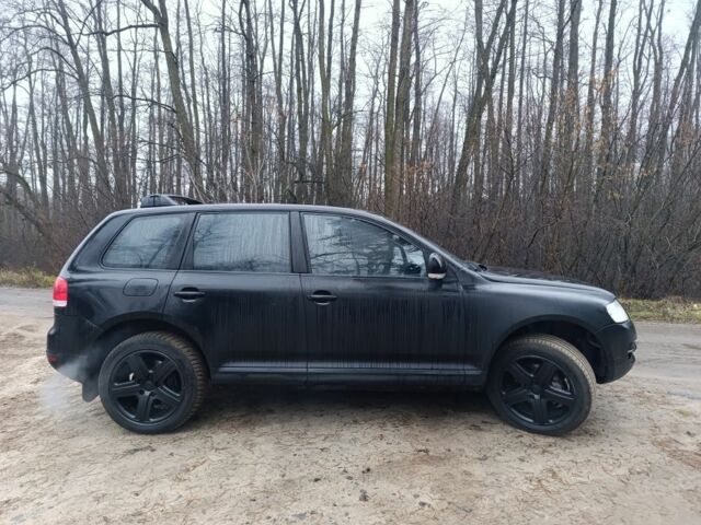 Черный Фольксваген Туарег, объемом двигателя 3 л и пробегом 333 тыс. км за 3950 $, фото 1 на Automoto.ua