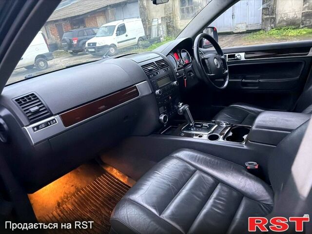 Чорний Фольксваген Туарег, об'ємом двигуна 3 л та пробігом 277 тис. км за 4300 $, фото 7 на Automoto.ua