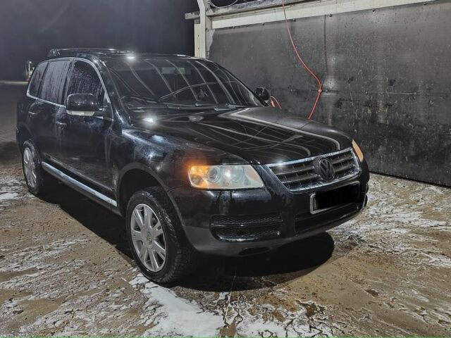 Черный Фольксваген Туарег, объемом двигателя 2.5 л и пробегом 345 тыс. км за 4720 $, фото 2 на Automoto.ua