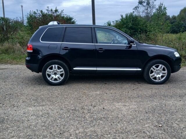 Черный Фольксваген Туарег, объемом двигателя 3 л и пробегом 408 тыс. км за 10500 $, фото 1 на Automoto.ua