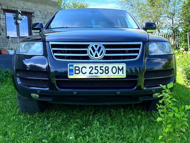 Черный Фольксваген Туарег, объемом двигателя 3 л и пробегом 200 тыс. км за 13000 $, фото 1 на Automoto.ua