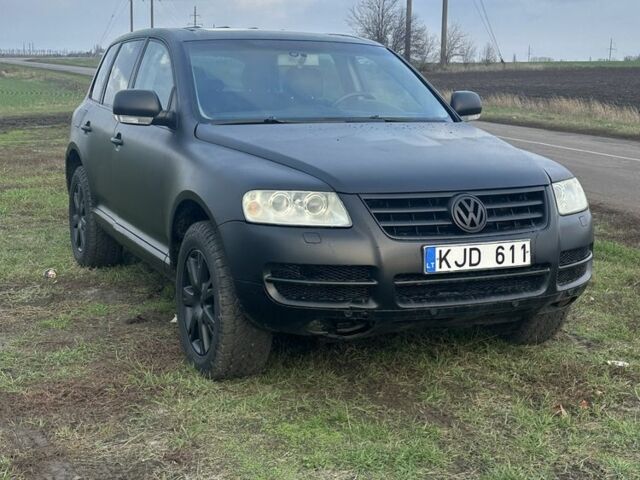 Чорний Фольксваген Туарег, об'ємом двигуна 3 л та пробігом 326 тис. км за 4800 $, фото 2 на Automoto.ua