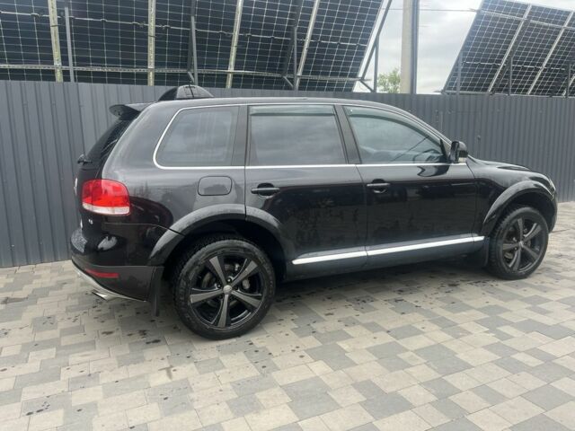 Черный Фольксваген Туарег, объемом двигателя 4.2 л и пробегом 250 тыс. км за 9999 $, фото 5 на Automoto.ua