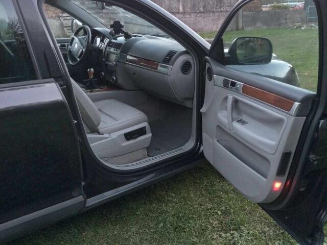 Черный Фольксваген Туарег, объемом двигателя 0 л и пробегом 281 тыс. км за 4500 $, фото 5 на Automoto.ua