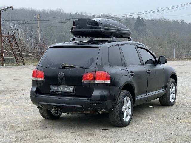 Чорний Фольксваген Туарег, об'ємом двигуна 3 л та пробігом 496 тис. км за 3999 $, фото 4 на Automoto.ua