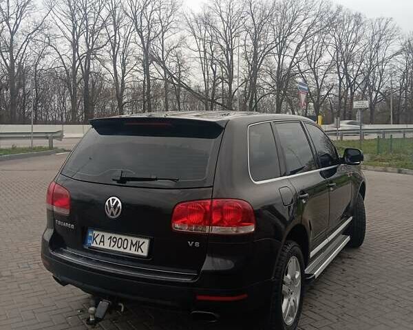 Черный Фольксваген Туарег, объемом двигателя 4.17 л и пробегом 316 тыс. км за 7500 $, фото 3 на Automoto.ua