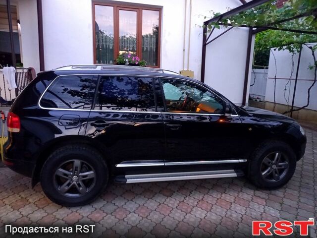 Черный Фольксваген Туарег, объемом двигателя 3.2 л и пробегом 204 тыс. км за 7700 $, фото 7 на Automoto.ua