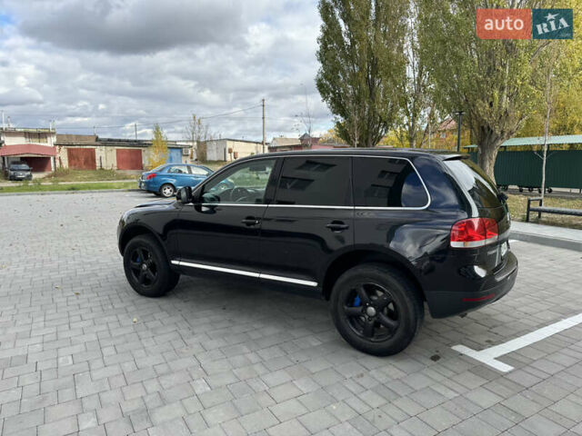Черный Фольксваген Туарег, объемом двигателя 2.97 л и пробегом 325 тыс. км за 8850 $, фото 21 на Automoto.ua
