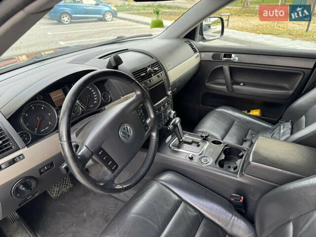 Черный Фольксваген Туарег, объемом двигателя 2.97 л и пробегом 325 тыс. км за 8850 $, фото 22 на Automoto.ua