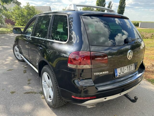 Черный Фольксваген Туарег, объемом двигателя 5 л и пробегом 320 тыс. км за 3600 $, фото 3 на Automoto.ua