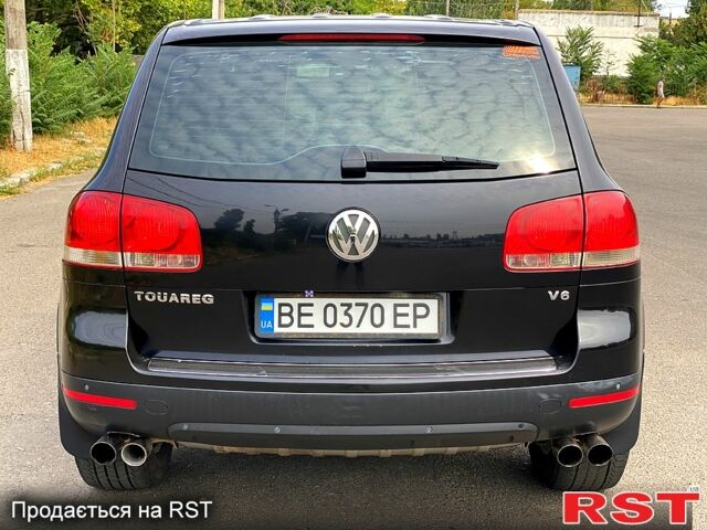 Черный Фольксваген Туарег, объемом двигателя 3.2 л и пробегом 243 тыс. км за 8500 $, фото 3 на Automoto.ua