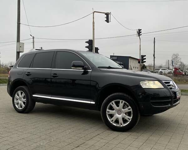 Черный Фольксваген Туарег, объемом двигателя 2.97 л и пробегом 390 тыс. км за 8700 $, фото 3 на Automoto.ua