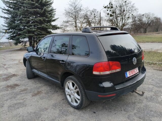 Черный Фольксваген Туарег, объемом двигателя 3 л и пробегом 300 тыс. км за 6500 $, фото 8 на Automoto.ua