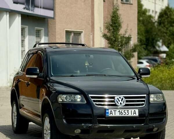 Черный Фольксваген Туарег, объемом двигателя 2.97 л и пробегом 260 тыс. км за 9500 $, фото 6 на Automoto.ua