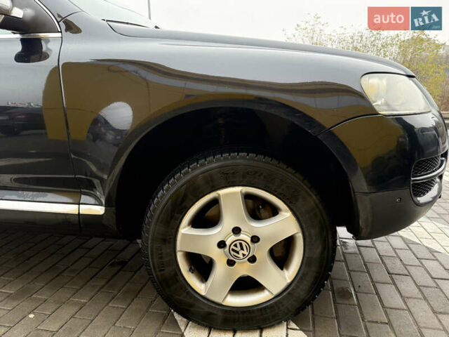 Черный Фольксваген Туарег, объемом двигателя 2.97 л и пробегом 329 тыс. км за 9500 $, фото 4 на Automoto.ua