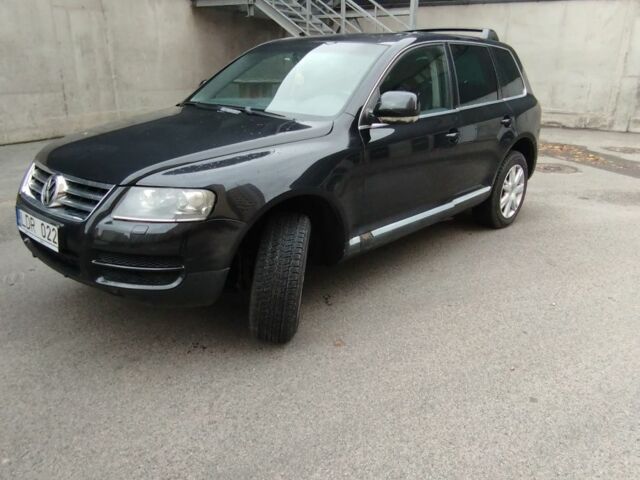 Чорний Фольксваген Туарег, об'ємом двигуна 3 л та пробігом 326 тис. км за 5500 $, фото 1 на Automoto.ua