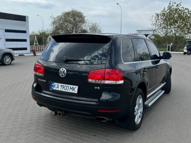 Черный Фольксваген Туарег, объемом двигателя 4.2 л и пробегом 318 тыс. км за 6500 $, фото 2 на Automoto.ua